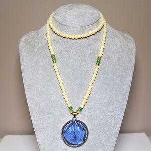 The "Two Golden Fish" Pearl Necklace.